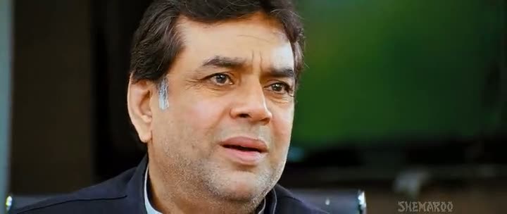 Screen Shot Of Hindi Movie OMG Oh My God 2012 300MB Short Size Download And Watch Online Free at worldfree4u.com